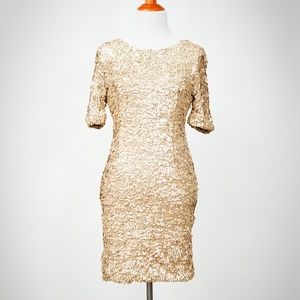 Vintage backless gold sequin dress by ARYN K